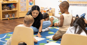 Bright and welcoming early learning classroom at Grateful Hearts Inc. in Las Vegas, featuring activity centers, child-sized furniture, and licensed affordable childcare learning materials.